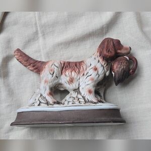 Vinntage Springer Spaniel hunting dog porcelain figurine with a bird